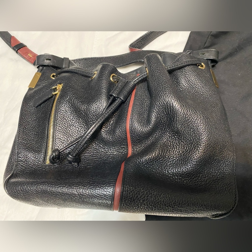 Times Arrow bucket bag with dust cover